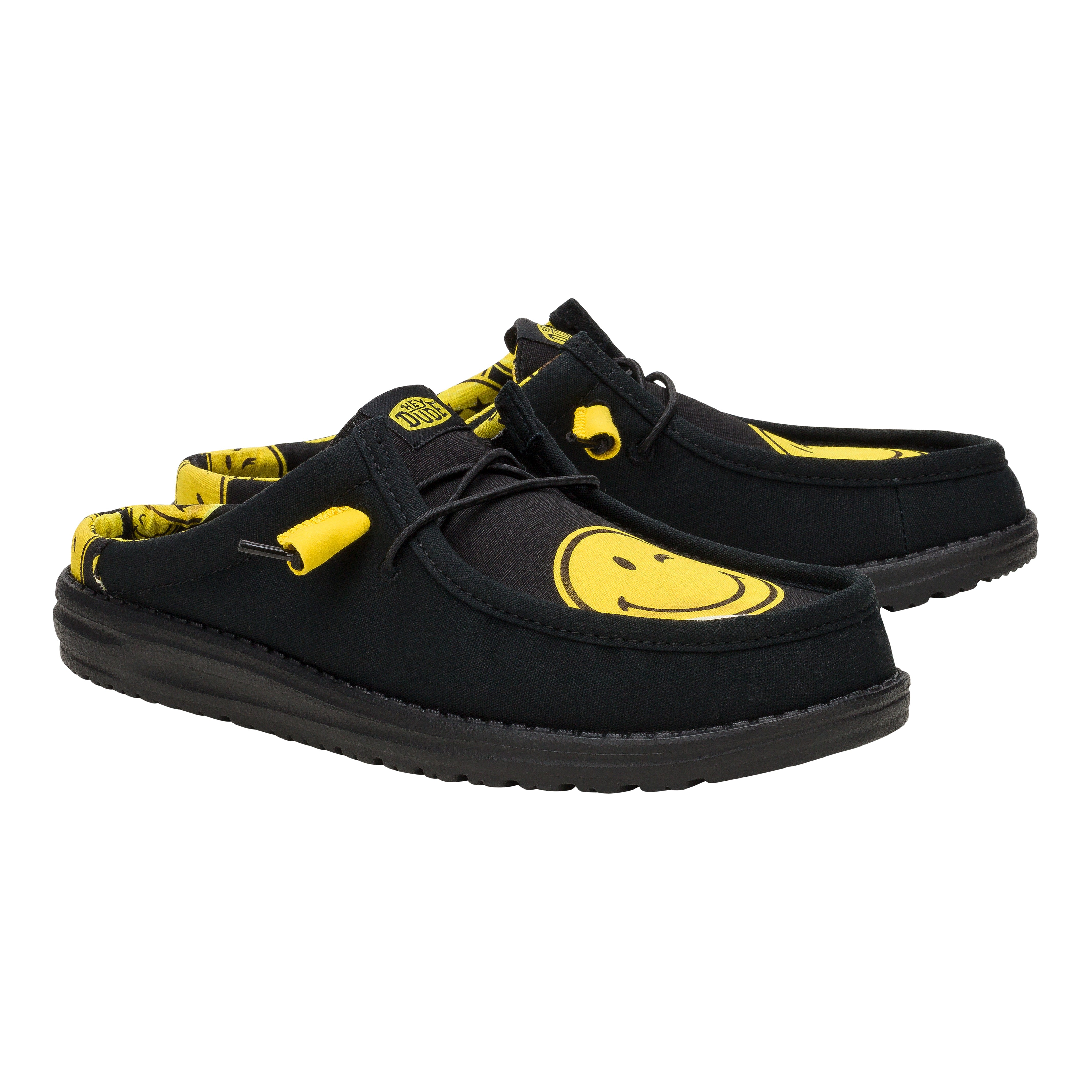 Smiley Black/Yellow Slip-On Shoes for Travel | HEYDUDE Wally